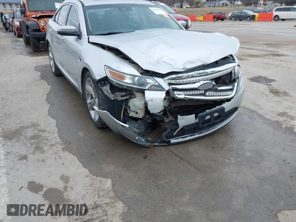 2012 Ford Taurus SHO z VIN 1FAHP2KT6CG142954, wystawiony jako IAAI lot #41526760 z przebiegiem 187 887 mil mil oraz . Historia ofert i sprzedaży dostępna na DreamBid. Obrazek 6.