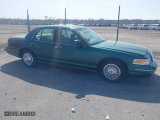 2000 Ford Crown Victoria with VIN 2FAFP73W9YX117108, listed as a IAAI auction lot 41713328 with 83,018 mi miles. Bid and sale history available at carsss.com. Image 1.
