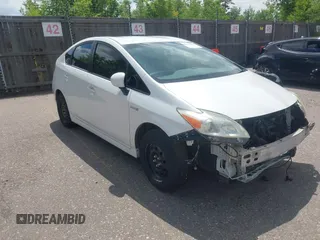 2013 Toyota Prius One z VIN JTDKN3DU0D5613429, wystawiony jako IAAI lot #42360759 z przebiegiem 254 105 mil mil oraz . Historia ofert i sprzedaży dostępna na DreamBid. Obrazek 1.