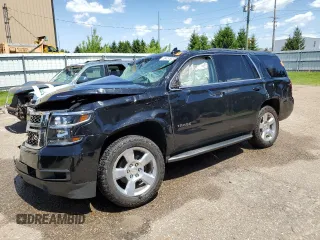 2019 Chevrolet Tahoe LT z VIN 1GNSKBKC4KR115163, wystawiony jako Copart lot #56834605 z przebiegiem Nie podano mil oraz Czysty tytuł • Clean title. Historia ofert i sprzedaży dostępna na DreamBid. Obrazek 1.