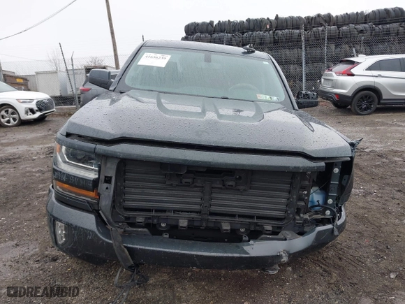 2018 Chevrolet Silverado 1500 LT with VIN 1GCVKREC9JZ200573, listed as a IAAI auction lot 41656239 with 74,000 mi miles. Bid and sale history available at carsss.com. Image 11.