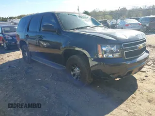 2013 Chevrolet Tahoe Commercial with VIN 1GNLC2E05DR266048, listed as a IAAI auction lot 40848505 with 95,459 mi miles and . Bid and sale history available at DreamBid. Image 1.