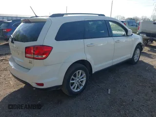2017 Dodge Journey SXT z VIN 3C4PDCBG9HT589904, wystawiony jako IAAI lot #42084994 z przebiegiem 130 194 mil mil oraz . Historia ofert i sprzedaży dostępna na DreamBid. Obrazek 4.
