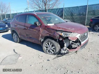 2020 Hyundai Tucson Value with VIN KM8J3CA42LU149811, listed as a IAAI auction lot 41642255 with 60,936 mi miles. Bid and sale history available at carsss.com. Image 1.