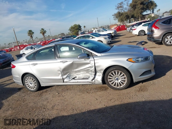 2014 Ford Fusion SE Hybrid with VIN 3FA6P0LU4ER206343, listed as a IAAI auction lot 41600260 with 198,834 mi miles and . Bid and sale history available at DreamBid. Image 13.