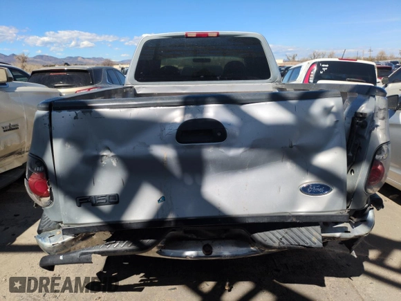 1998 Ford F-150 with VIN 2FTZX0729WCA50004, listed as a Copart auction lot 50028895 with 291,952 mi miles and Salvage title. Bid and sale history available at DreamBid. Image 6.