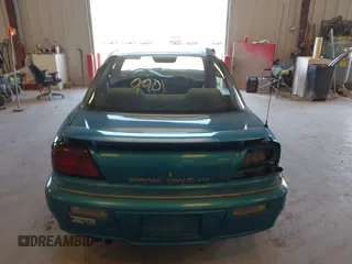 1994 Pontiac Grand Am z VIN 1G2NE15M5RM500643, wystawiony jako IAAI lot #42069901 z przebiegiem 77 129 mil mil oraz . Historia ofert i sprzedaży dostępna na DreamBid. Obrazek 16.