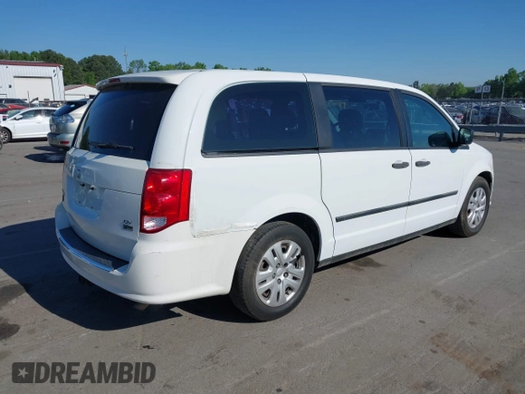 2015 Dodge Grand Caravan SE with VIN 2C4RDGBGXFR569435, listed as a IAAI auction lot 42057084 with 160,058 mi miles and . Bid and sale history available at DreamBid. Image 4.