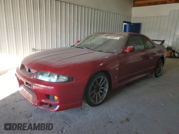 1997 Nissan Skyline z VIN BCNR33042682, wystawiony jako Copart lot #76562674 z przebiegiem 61 791 mil mil oraz Czysty tytuł • Clean title. Historia ofert i sprzedaży dostępna na DreamBid. Obrazek 1.