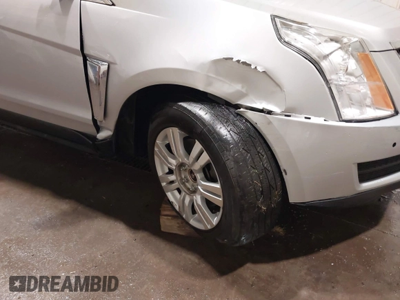 2016 Cadillac SRX Luxury Collection with VIN 3GYFNEE3XGS566210, listed as a IAAI auction lot 42094984 with 99,671 mi miles and . Bid and sale history available at DreamBid. Image 6.