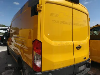 2018 Ford Transit z VIN 1FTYR2CMXJKB45362, wystawiony jako IAAI lot #35823722 z przebiegiem 247 767 mil mil oraz . Historia ofert i sprzedaży dostępna na DreamBid. Obrazek 3.