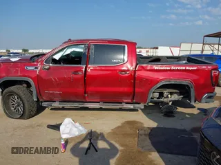 2019 GMC Sierra 1500 SLT z VIN 1GTU9DED2KZ210981, wystawiony jako IAAI lot #42315099 z przebiegiem Nie podano mil oraz . Historia ofert i sprzedaży dostępna na DreamBid. Obrazek 14.