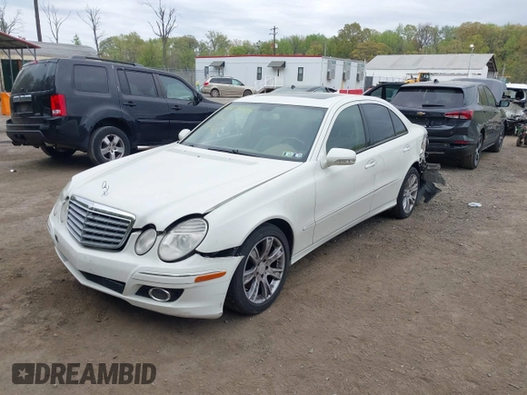 2009 Mercedes-Benz E Luxury 3.5L with VIN WDBUF87X59B426574, listed as a IAAI auction lot 42071063 with 135,622 mi miles. Bid and sale history available at carsss.com. Image 2.