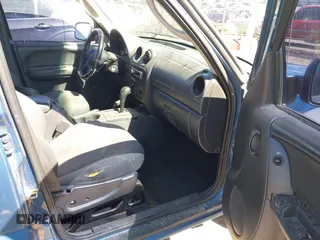 2003 Jeep Liberty Sport with VIN 1J4GL48K03W569834, listed as a IAAI auction lot 42061973 with 278,475 mi miles. Bid and sale history available at carsss.com. Image 5.