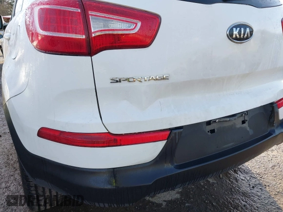 2012 Kia Sportage LX with VIN KNDPB3A24C7317060, listed as a IAAI auction lot 41725826 with 122,574 mi miles. Bid and sale history available at carsss.com. Image 6.