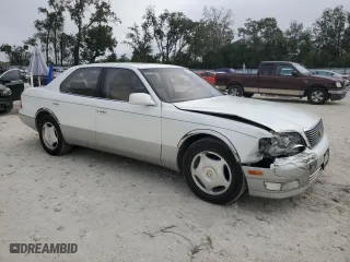1998 Lexus LS 400 Luxury Sdn with VIN JT8BH28F4W0121580, listed as a Copart auction lot 86534644 with 143,254 mi miles and Salvage Title. Bid and sale history available at carsss.com. Image 4.