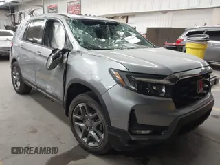 2023 Honda Passport EX-L z VIN 5FNYF8H56PB025612, wystawiony jako IAAI lot #41937956 z przebiegiem 31 065 mil mil oraz . Historia ofert i sprzedaży dostępna na DreamBid. Obrazek 1.