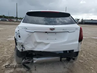 2022 Cadillac XT5 FWD Premium Luxury z VIN 1GYKNCRS0NZ175748, wystawiony jako Copart lot #61651885 z przebiegiem 13 747 mil mil oraz Szkoda całkowita • Salvage title. Historia ofert i sprzedaży dostępna na DreamBid. Obrazek 6.