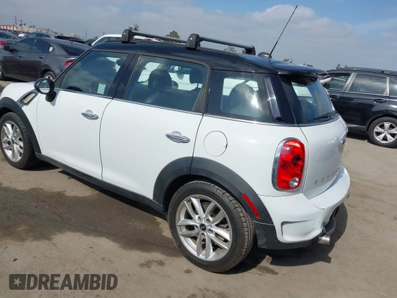 2013 MINI Countryman S with VIN WMWZC3C55DWP24628, listed as a IAAI auction lot 42558387 with 169,269 mi miles and . Bid and sale history available at DreamBid. Image 3.