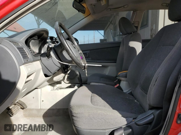 2005 Kia Spectra with VIN KNAFE162255129620, listed as a Copart auction lot 86822464 with 249,516 mi miles and Salvage Title. Bid and sale history available at carsss.com. Image 7.