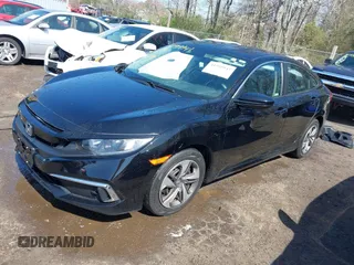 2020 Honda Civic LX with VIN 2HGFC2F69LH532499, listed as a IAAI auction lot 41919941 with 96,936 mi miles and . Bid and sale history available at DreamBid. Image 18.