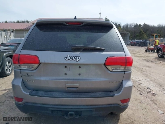 2014 Jeep Grand Cherokee Laredo with VIN 1C4RJFAG7EC243121, listed as a IAAI auction lot 41925695 with 147,999 mi miles. Bid and sale history available at carsss.com. Image 16.