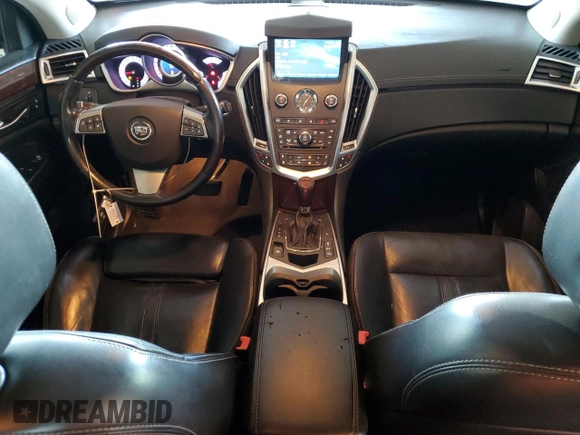 2012 Cadillac SRX Premium Collection z VIN 3GYFNFE30CS599863, wystawiony jako Copart lot #61249995 z przebiegiem 144 740 mil mil oraz Czysty tytuł • Clean title. Historia ofert i sprzedaży dostępna na DreamBid. Obrazek 8.