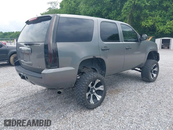 2007 Chevrolet Tahoe LT with VIN 1GNFK13017J290475, listed as a IAAI auction lot 42352808 with 148,086 mi miles and . Bid and sale history available at DreamBid. Image 4.