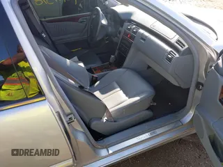 2001 Mercedes-Benz E-Class with VIN WDBJF65J61B373135, listed as a IAAI auction lot 42149598 with 123,314 mi miles. Bid and sale history available at carsss.com. Image 5.