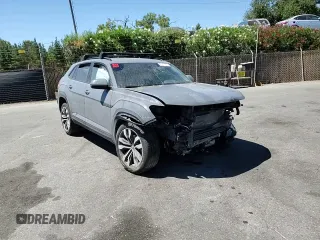 2021 Volkswagen Atlas SEL z VIN 1V2SE2CA9MC201392, wystawiony jako Copart lot #66317304 z przebiegiem Nie podano mil oraz Szkoda całkowita • Salvage title. Historia ofert i sprzedaży dostępna na DreamBid. Obrazek 12.