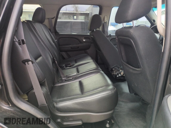 2014 Chevrolet Tahoe Commercial z VIN 1GNLC2E06ER207611, wystawiony jako Copart lot #51472355 z przebiegiem 125 893 mil mil oraz Szkoda całkowita • Salvage title. Historia ofert i sprzedaży dostępna na DreamBid. Obrazek 11.