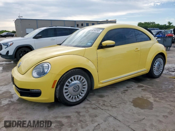 2014 Volkswagen Beetle 2.5L with VIN 3VWJX7AT2EM610372, listed as a Copart auction lot 60163345 with 121,497 mi miles and Salvage title. Bid and sale history available at DreamBid. Image 1.