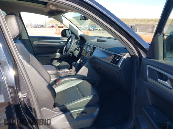 2018 Volkswagen Atlas SEL with VIN 1V2ER2CAXJC582408, listed as a IAAI auction lot 41389461 with 60,822 mi miles and . Bid and sale history available at DreamBid. Image 5.