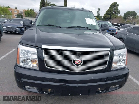 2005 Cadillac Escalade z VIN 1GYEC63T95R181022, wystawiony jako IAAI lot #41777173 z przebiegiem 44 348 mil mil oraz . Historia ofert i sprzedaży dostępna na DreamBid. Obrazek 11.