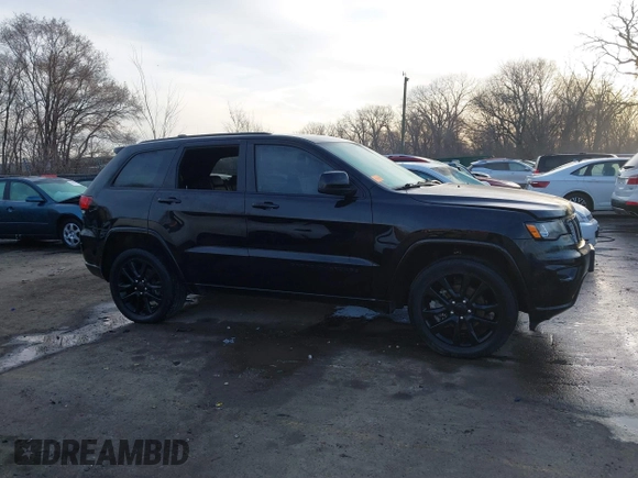 2019 Jeep Grand Cherokee Laredo E with VIN 1C4RJFAG4KC608897, listed as a IAAI auction lot 41771603 with 106,525 mi miles and . Bid and sale history available at DreamBid. Image 13.