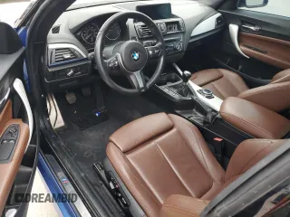 2015 BMW 2 Series M235i z VIN WBA1J7C54FV288793, wystawiony jako Copart lot #42937235 z przebiegiem Nie podano mil oraz Czysty tytuł • Clean title. Historia ofert i sprzedaży dostępna na DreamBid. Obrazek 8.