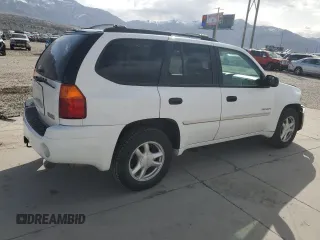 2006 GMC Envoy SLE z VIN 1GKDT13S462156541, wystawiony jako Copart lot #52500615 z przebiegiem 140 558 mil mil oraz Szkody całkowita. Historia ofert i sprzedaży dostępna na DreamBid. Obrazek 3.