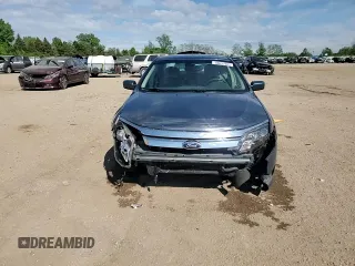 2012 Ford Fusion Hybrid z VIN 3FADP0L33CR288819, wystawiony jako Copart lot #56697025 z przebiegiem 65 486 mil mil oraz Szkoda całkowita • Salvage title. Historia ofert i sprzedaży dostępna na DreamBid. Obrazek 13.