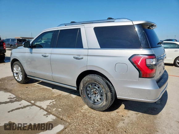 2019 Ford Expedition Platinum with VIN 1FMJU1MT4KEA65194, listed as a Copart auction lot 58161715 with 100,983 mi miles and Salvage title. Bid and sale history available at DreamBid. Image 2.
