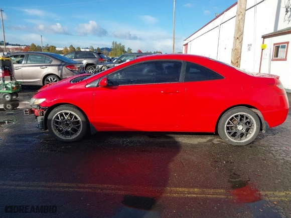 2009 Honda Civic Cpe EX with VIN 2HGFG11839H521899, listed as a IAAI auction lot 40613302 with 227,958 mi miles. Bid and sale history available at carsss.com. Image 15.