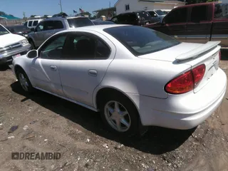 2000 Oldsmobile Alero GL2 z VIN 1G3NL52E4YC403539, wystawiony jako IAAI lot #42313033 z przebiegiem Nie podano mil oraz . Historia ofert i sprzedaży dostępna na DreamBid. Obrazek 3.