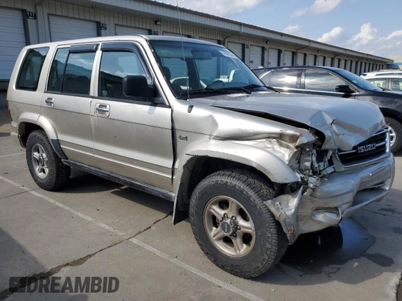 1999 Isuzu Trooper S with VIN JACDJ58X6X7924973, listed as a Copart auction lot 57881235 with 269,301 mi miles and Salvage title. Bid and sale history available at DreamBid. Image 4.