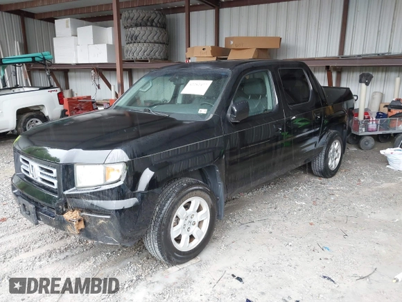 2007 Honda Ridgeline RTL with VIN 2HJYK16547H549241, listed as a IAAI auction lot 42282477 with 214,685 mi miles and . Bid and sale history available at DreamBid. Image 18.
