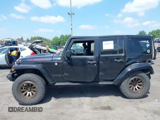 2017 Jeep Wrangler Unlimited Rubicon Recon with VIN 1C4BJWFG7HL525709, listed as a IAAI auction lot 42569577 with 119,560 mi miles and . Bid and sale history available at DreamBid. Image 14.