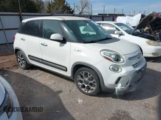 2014 FIAT 500L Trekking with VIN ZFBCFADHXEZ009960, listed as a IAAI auction lot 41771280 with 123,559 mi miles. Bid and sale history available at carsss.com. Image 1.