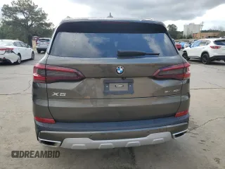 2023 BMW X5 sDrive40i with VIN 5UXCR4C07P9N73360, listed as a Copart auction lot 51128055 with Not provided miles and Salvage title. Bid and sale history available at DreamBid. Image 6.