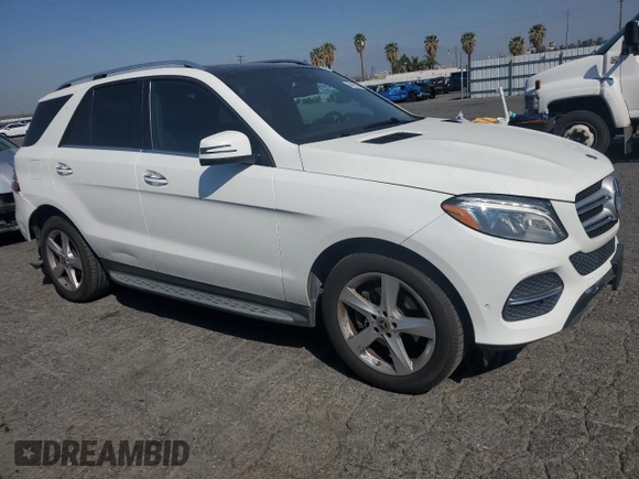 2018 Mercedes-Benz GLE 350 with VIN 4JGDA5HB3JB060972, listed as a Copart auction lot 54412195 with 69,471 mi miles and Salvage title. Bid and sale history available at DreamBid. Image 4.