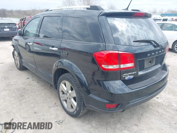 2014 Dodge Journey Limited with VIN 3C4PDDDG6ET118355, listed as a IAAI auction lot 42030856 with 164,740 mi miles and . Bid and sale history available at carsss.com. Image 3.