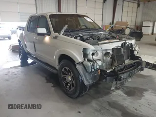 2010 Ford Explorer Sport Trac Limited с VIN 1FMEU3DE3AUA54349, выставлен на аукционе IAAI как лот 41287383 с пробегом 92 865 миль миль и . История ставок и продаж доступна на DreamBid. Изображение 1.