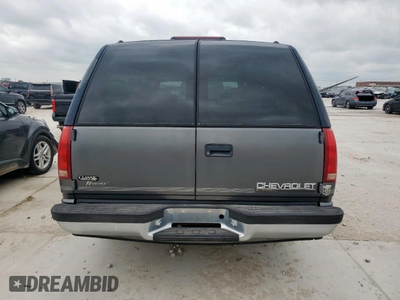 1999 Chevrolet Suburban with VIN 1GBEC16R0XJ434453, listed as a Copart auction lot 54711725 with 179,597 mi miles and Clean title. Bid and sale history available at DreamBid. Image 6.